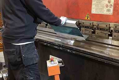 Applying the final fold on a channel using our press brake
