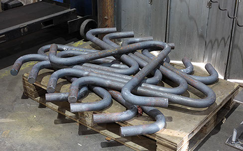 Formed bars using heat to bend