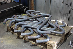 Formed bars using heat to bend