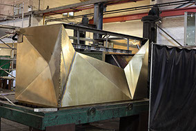 Folded and welded bronze fabrication